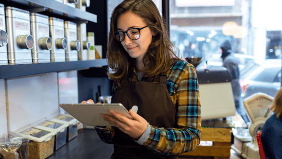 retail employee doing inventory check 