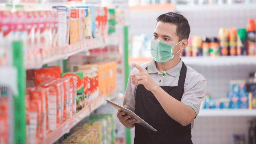 Retail employee wearing mask