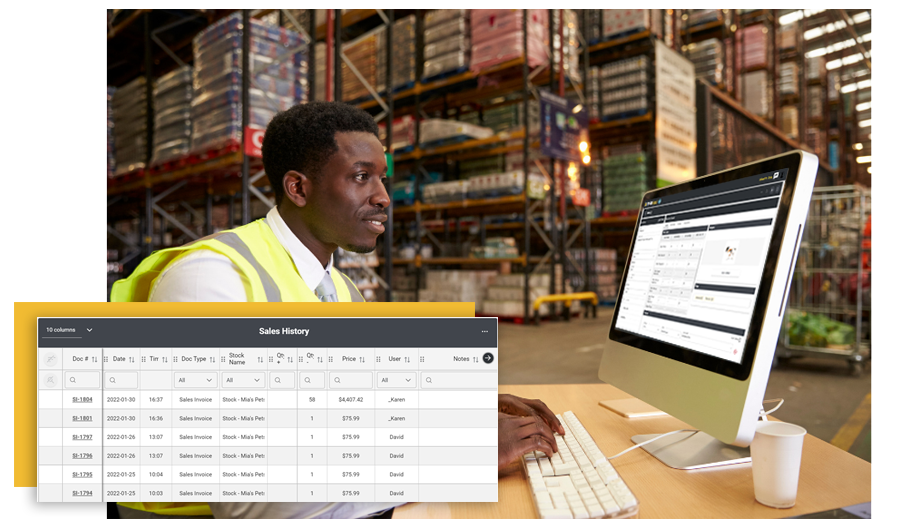 Man checking inventory in a warehouse.