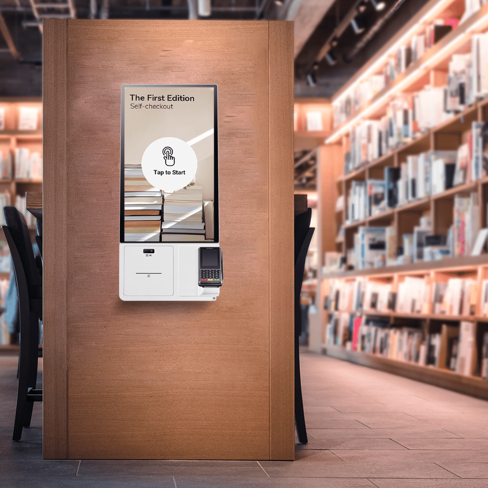 TAKU Kiosk mounted on a book store wall