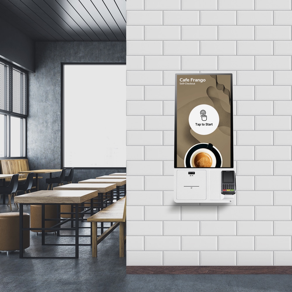 TAKU Self-Checkout kiosk mounted on a wall