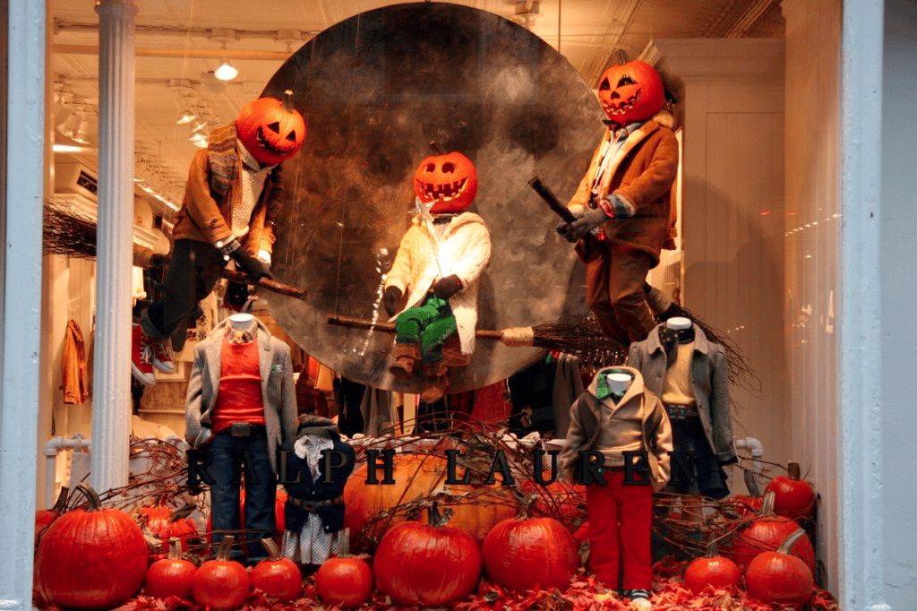 Mannequins with Pumpkin heads showing off Autumn fashion lines